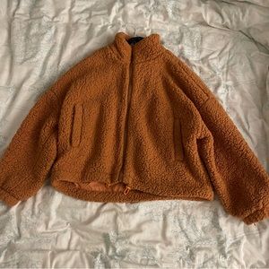 Urban Outfitters Orange Teddy Bear Fleece